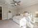 Main bedroom with carpeted floors, ceiling fan, and large windows at 946 Emory Ln, Fort Mill, SC 29708