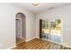 Dining area with sliding glass doors to backyard at 13104 Serenity St, Huntersville, NC 28078