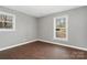 Well-lit bedroom with wood flooring and a window at 1637 Sumner Dr, Rock Hill, SC 29732