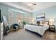 Relaxing main bedroom with bay window and soft color palette at 204 Planters Way, Mount Holly, NC 28120