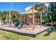 Community playground with shade structure, slides, and climbing equipment at 210 South Haven Dr, Mooresville, NC 28117