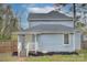 Rear view of a charming light blue house with a white porch at 329 State St, Rock Hill, SC 29730