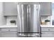 Stainless steel refrigerator with gray cabinets at 329 State St, Rock Hill, SC 29730