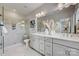 Double vanity bathroom with a large walk-in shower at 505 Annie Lowery Way, Davidson, NC 28036