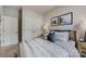 Well-lit bedroom featuring a double bed and built-in closet at 517 Annie Lowery Way, Davidson, NC 28036