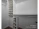 Spacious closet with shelving and hanging rod at 711 Crystal Lynn Dr, Lowell, NC 28098