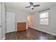 Bedroom with hardwood floors, a dresser, and access to a bathroom at 161 Westscott Dr, Statesville, NC 28625