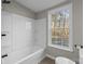 Clean bathroom with a shower/tub combo and window at 2029 Big Dipper Dr, Clover, SC 29710