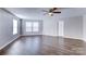 Bright bedroom with hardwood floors and two windows at 3894 Shasta Cir, Clover, SC 29710