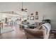 Spacious living room with hardwood floors, vaulted ceiling and comfortable sectional sofa at 8931 Meadow Vista Rd, Charlotte, NC 28213