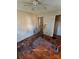 Bedroom with hardwood floors and damaged walls and trim at 934 Pebble Rd, Rock Hill, SC 29730