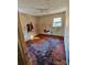 Bedroom with hardwood floors, damaged walls, and ceiling at 934 Pebble Rd, Rock Hill, SC 29730