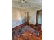 Bedroom with hardwood floors and damaged walls and trim at 934 Pebble Rd, Rock Hill, SC 29730