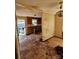 Kitchen with damaged floors and walls needing renovation at 934 Pebble Rd, Rock Hill, SC 29730