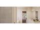 Bathroom with double vanity, shower, and view into bedroom at 0 S Potter Rd # 1A, Waxhaw, NC 28173