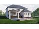 Home with pool, deck, and patio furniture in the backyard at 0 S Potter Rd # 1A, Waxhaw, NC 28173