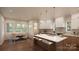 Modern kitchen featuring an island, ample cabinetry, and a breakfast nook at 0 S Potter Rd # 1A, Waxhaw, NC 28173