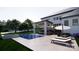 Luxury pool and spa with patio furniture and umbrella at 0 S Potter Rd # 1A, Waxhaw, NC 28173