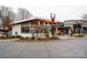 Jeni's Ice Creams shop with outdoor seating at 10528 Royal Winchester Dr, Charlotte, NC 28277