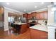 Eat-in kitchen with granite countertops and stainless steel appliances at 10528 Royal Winchester Dr, Charlotte, NC 28277