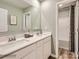 Clean bathroom with double vanity and shower/tub combo at 108 Mountain Bridge Way, Statesville, NC 28625