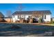 Backyard with firepit and view of home's exterior at 112 Henry Putnam Dr, Cherryville, NC 28021