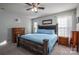 Spacious bedroom with king-size bed and wood dresser at 112 Henry Putnam Dr, Cherryville, NC 28021