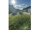 Large backyard with shed and high grass at 123 Hemlock Dr, Salisbury, NC 28147