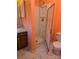 Bathroom with shower stall and orange walls at 1640 English Knoll Dr # 43, Matthews, NC 28105