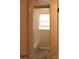Simple bathroom with a bathtub, tiled floor, and a window with blinds at 4605 Coronado Dr, Charlotte, NC 28212