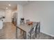 Simple dining area with gray table and four chairs at 5021 Markfield Ln, Monroe, NC 28110