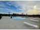 Community swimming pool with lounge chairs at 5021 Markfield Ln, Monroe, NC 28110