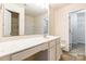 Clean bathroom with white vanity, bathtub, and updated fixtures at 8127 Paw Club Dr, Charlotte, NC 28214
