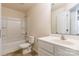 Clean bathroom with a shower/tub combo, toilet, and vanity at 8127 Paw Club Dr, Charlotte, NC 28214