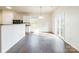 Spacious dining area with hardwood floors and sliding glass doors to patio at 8127 Paw Club Dr, Charlotte, NC 28214