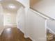 Bright entryway with hardwood floors and view of the living area at 8127 Paw Club Dr, Charlotte, NC 28214