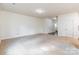 Spacious living room with neutral decor and carpet flooring at 8127 Paw Club Dr, Charlotte, NC 28214