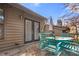 Back deck with teal table and chairs, umbrella at 924 Cranberry Cir # 50-C, Fort Mill, SC 29715