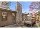 Stone chimney and wooden deck in backyard at 924 Cranberry Cir # 50-C, Fort Mill, SC 29715
