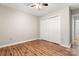 Simple bedroom with hardwood floors and double doors at 924 Cranberry Cir # 50-C, Fort Mill, SC 29715