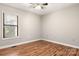Bedroom with hardwood floors and window with blinds at 924 Cranberry Cir # 50-C, Fort Mill, SC 29715