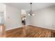 Dining area with hardwood floors and kitchen view at 924 Cranberry Cir # 50-C, Fort Mill, SC 29715
