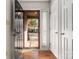 Front entry with wood floors and white doors at 924 Cranberry Cir # 50-C, Fort Mill, SC 29715