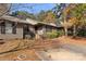 Front view of tan house with walkway and trees at 924 Cranberry Cir # 50-C, Fort Mill, SC 29715
