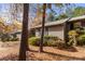 Side view of tan house with trees and landscaping at 924 Cranberry Cir # 50-C, Fort Mill, SC 29715