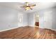 Main bedroom with hardwood floors and access to bathroom at 924 Cranberry Cir # 50-C, Fort Mill, SC 29715