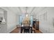 Bright dining room featuring a wood table, chairs, and large window at 13500 Kibworth Ln, Charlotte, NC 28273