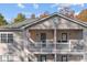 Private balcony with white railings, offering extra outdoor space at 19744 Feriba Pl, Cornelius, NC 28031