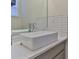 Modern bathroom with a rectangular vessel sink and white subway tile at 2632 Weddington Ave, Charlotte, NC 28204