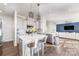 Modern kitchen with island, stainless steel appliances, and white quartz countertops at 3331 Laurel Oak Ln, Gastonia, NC 28056